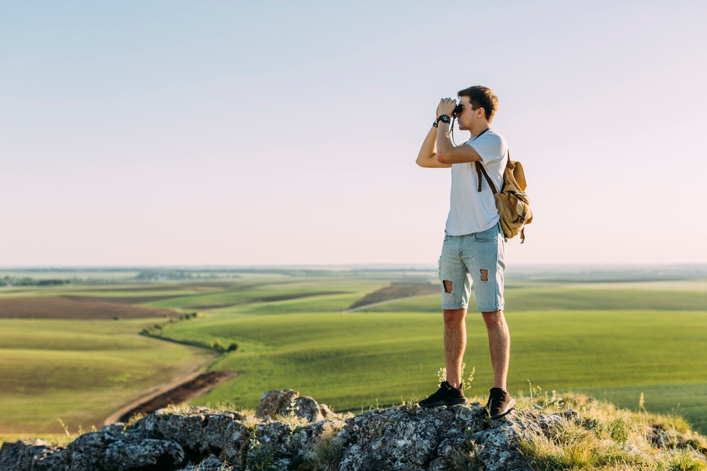 side-view-man-looking-through-binoculars_23-2147842493